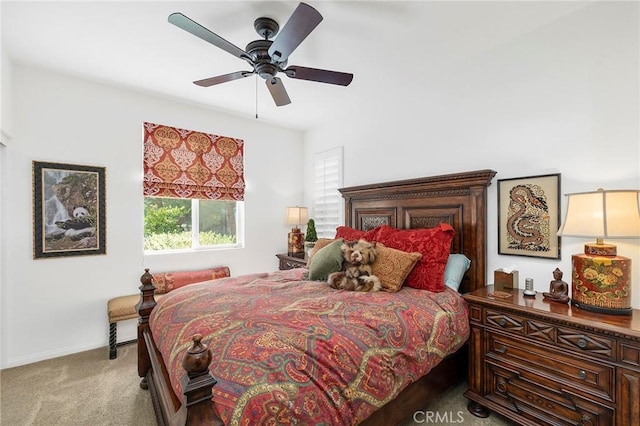 bedroom featuring ceiling fan and light colored carpet