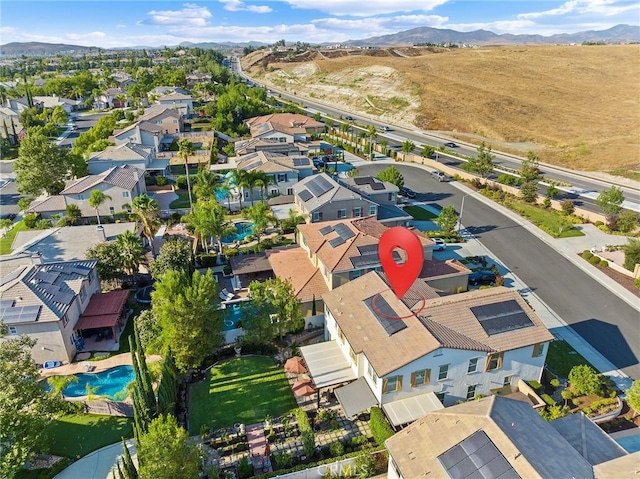 bird's eye view with a mountain view