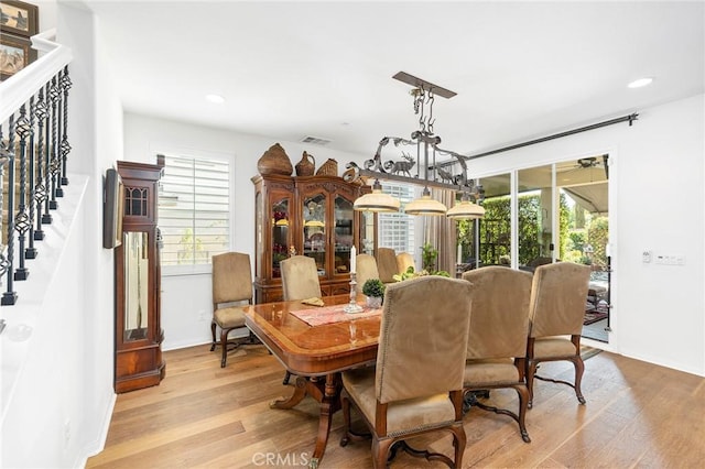 dining room featuring light hardwood / wood-style flooring