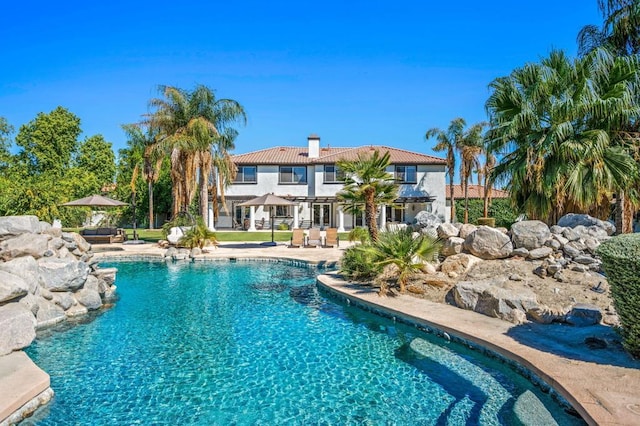 view of pool featuring a patio