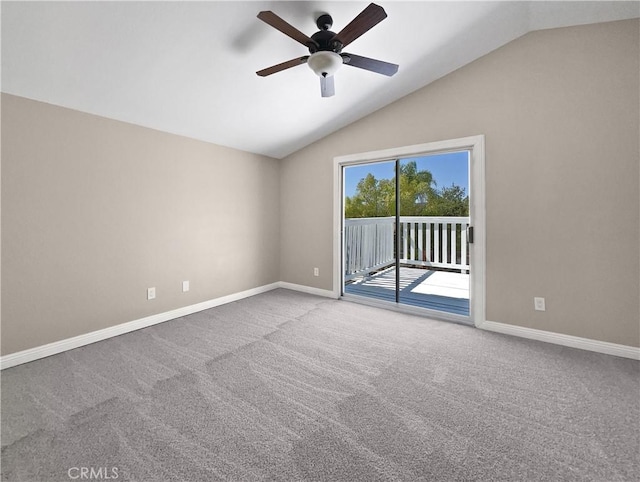 carpeted empty room with lofted ceiling and ceiling fan