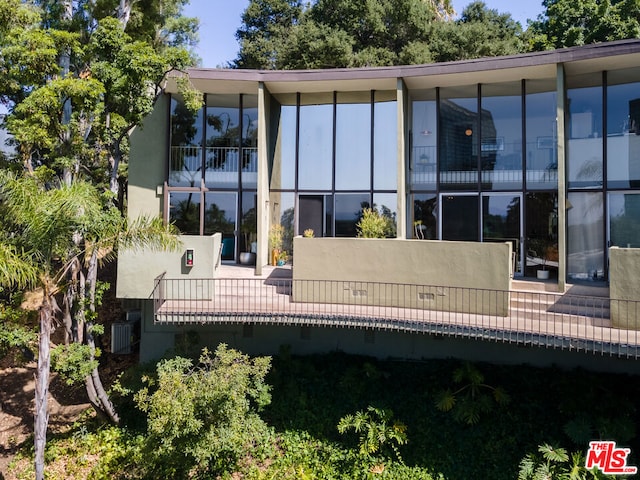 back of house with a patio