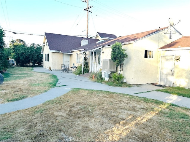 back of house with a patio