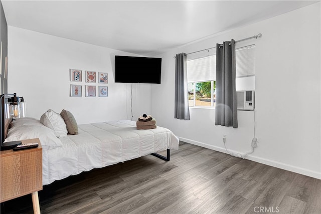 bedroom with wood-type flooring