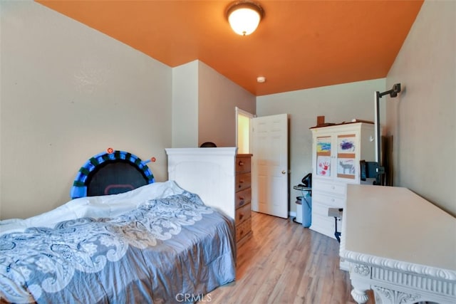 bedroom featuring light hardwood / wood-style floors