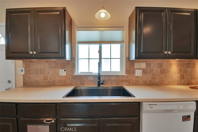 191 Hazel St, Gridley, CA 95948 - kitchen with white dishwasher, a sink, light countertops, and tasteful backsplash