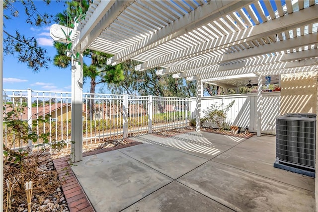 view of patio featuring cooling unit and a pergola