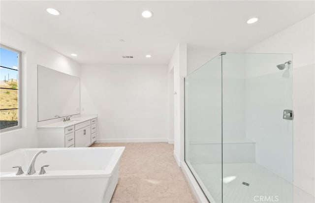 21239 W Wildflower Way, Chatsworth, CA 91311 - bathroom with a soaking tub, vanity, walk in shower, and recessed lighting