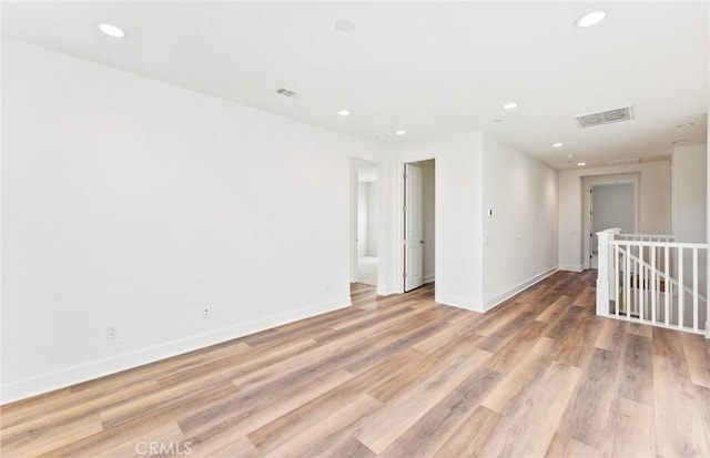 21239 W Wildflower Way, Chatsworth, CA 91311 - empty room with recessed lighting and light wood finished floors