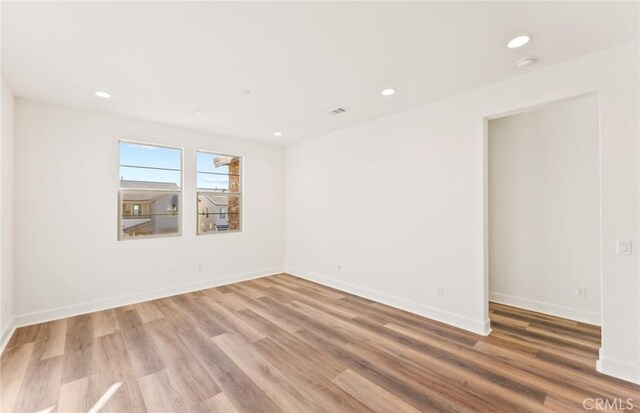 21239 W Wildflower Way, Chatsworth, CA 91311 - unfurnished room with wood finished floors, recessed lighting, and a smoke detector