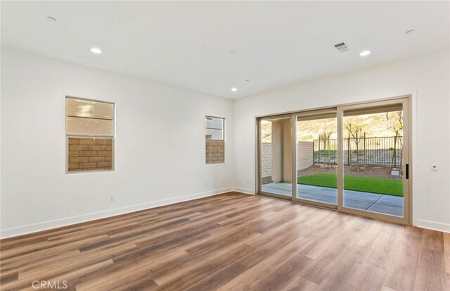 21239 W Wildflower Way, Chatsworth, CA 91311 - spare room featuring wood finished floors and recessed lighting