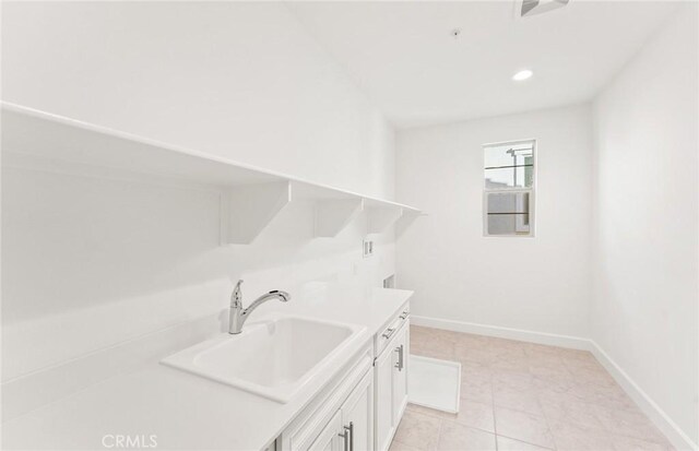 21239 W Wildflower Way, Chatsworth, CA 91311 - laundry room featuring hookup for a washing machine, recessed lighting, and cabinet space