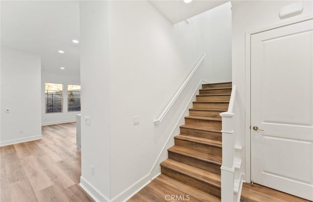 21239 W Wildflower Way, Chatsworth, CA 91311 - stairway with wood finished floors and recessed lighting