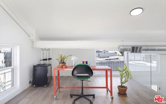 home office featuring light hardwood / wood-style floors