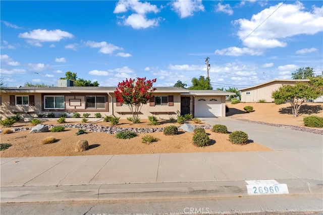 single story home with a garage