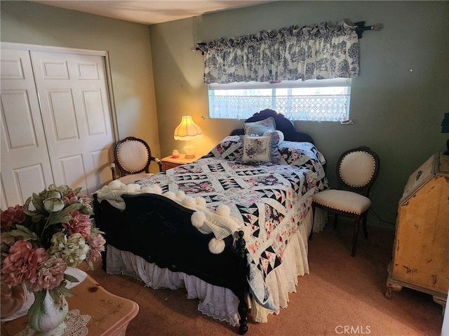 carpeted bedroom with a closet