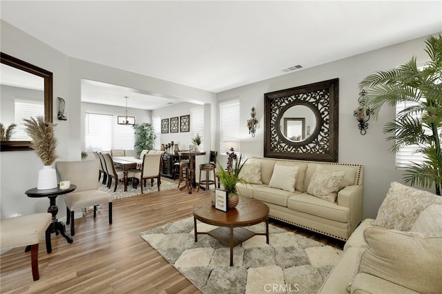 living room with light hardwood / wood-style floors