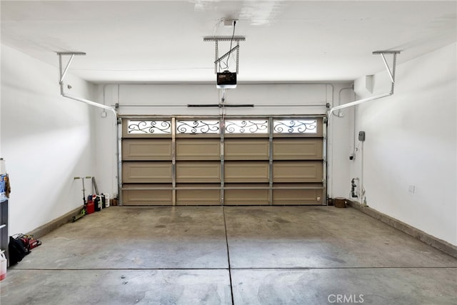 garage featuring a garage door opener