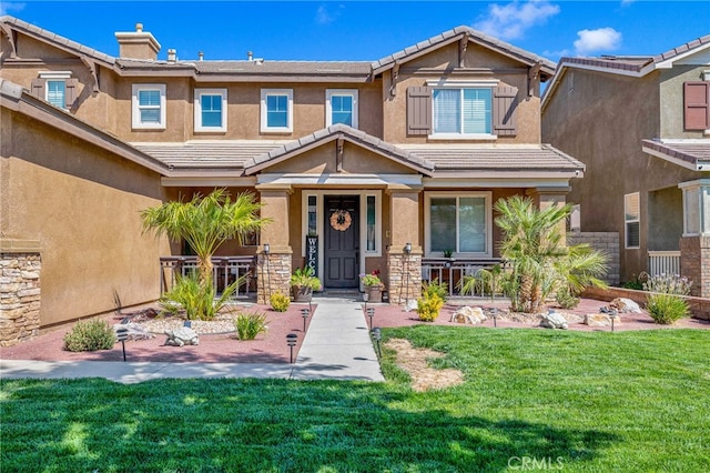 view of front of home with a front lawn