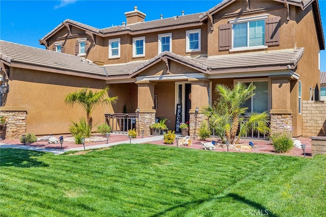 view of front of home featuring a front yard