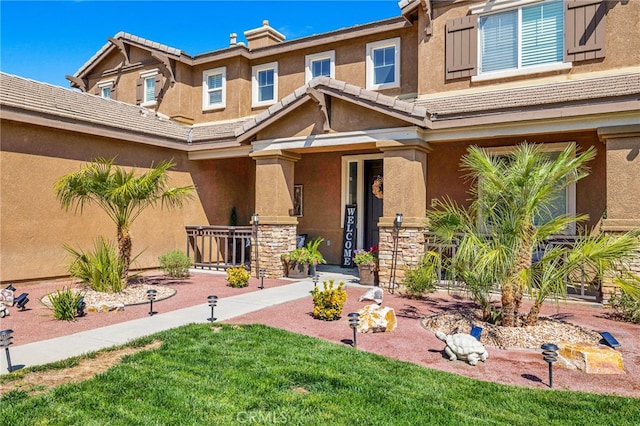 view of front of home with a front lawn