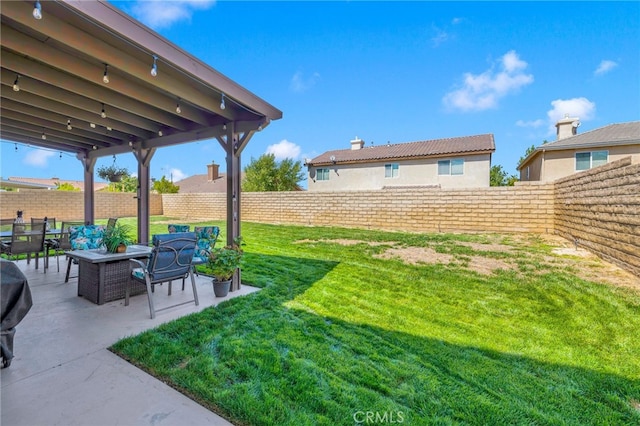 view of yard with outdoor lounge area and a patio area