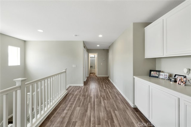 hallway with wood-type flooring