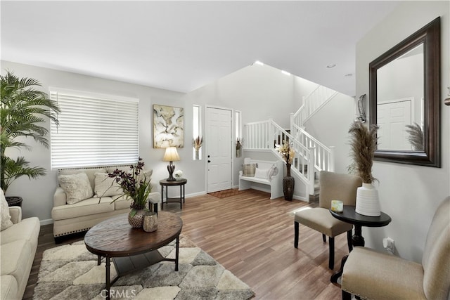 living room with light hardwood / wood-style flooring