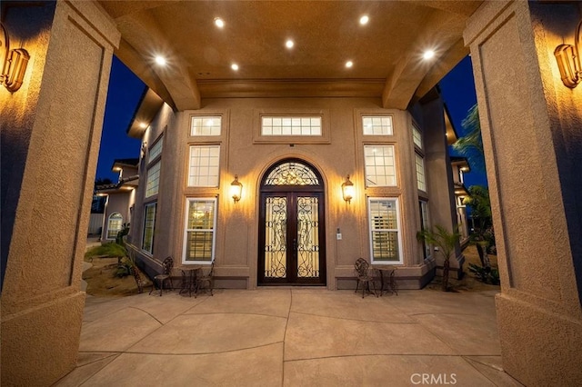 doorway to property featuring french doors