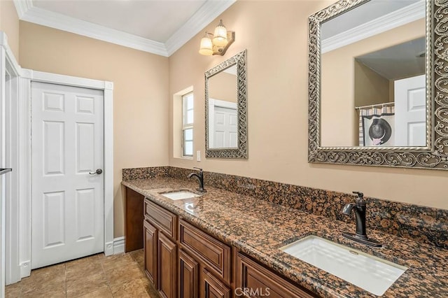 bathroom with tile patterned floors, crown molding, and vanity