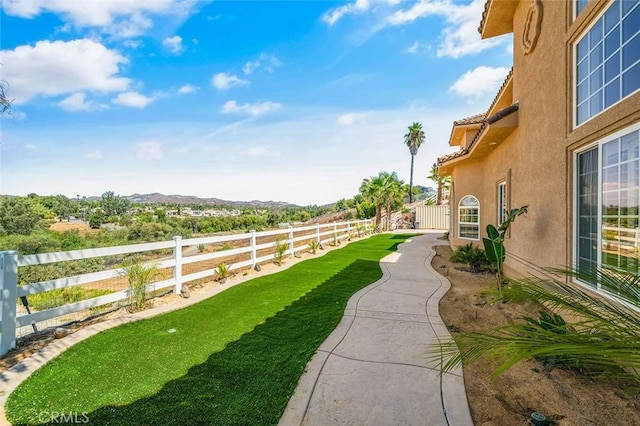 view of yard with a mountain view