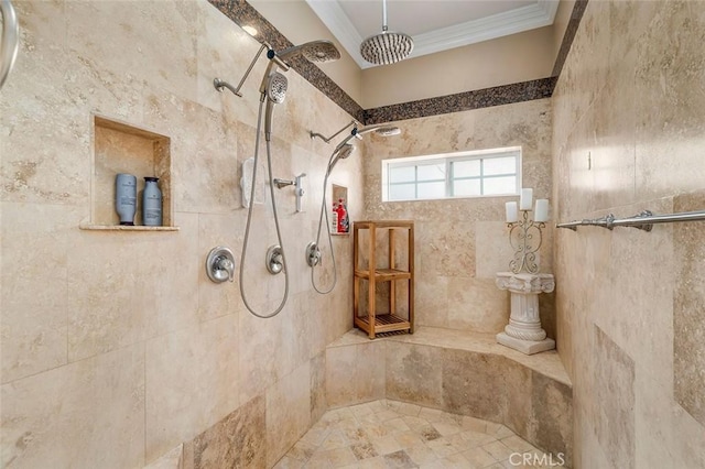 bathroom with tiled shower and ornamental molding