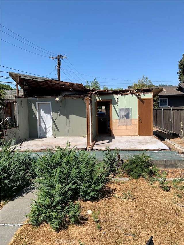 rear view of house with a patio area