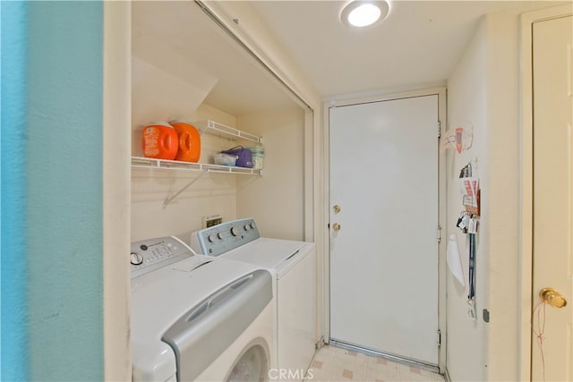 washroom featuring independent washer and dryer