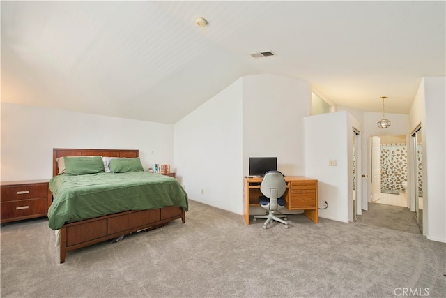 carpeted bedroom featuring vaulted ceiling