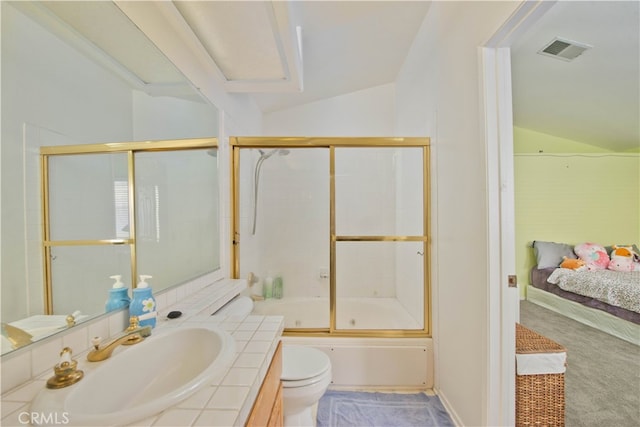 full bathroom featuring shower / bath combination with glass door, toilet, vanity, and vaulted ceiling