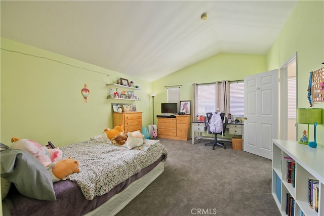 carpeted bedroom with lofted ceiling