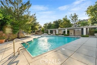 view of pool with a patio