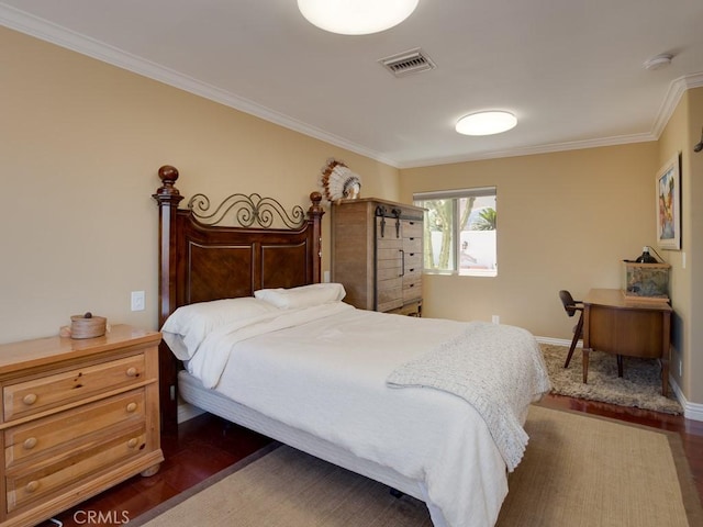 bedroom featuring dark hardwood / wood-style floors and ornamental molding