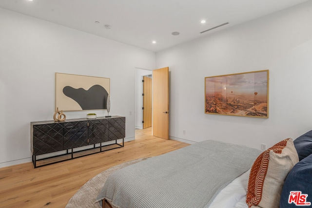 bedroom featuring light hardwood / wood-style floors