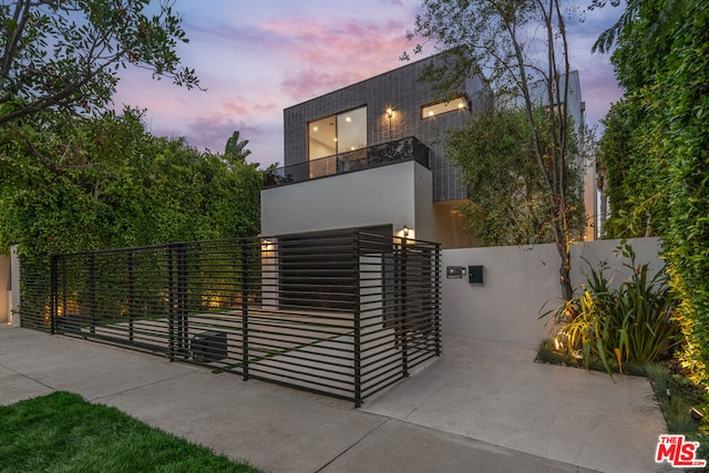 modern home featuring a balcony