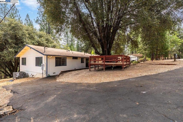 view of front of home with a wooden deck