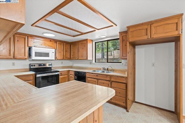 kitchen with stainless steel electric stove, light tile patterned flooring, kitchen peninsula, dishwasher, and sink