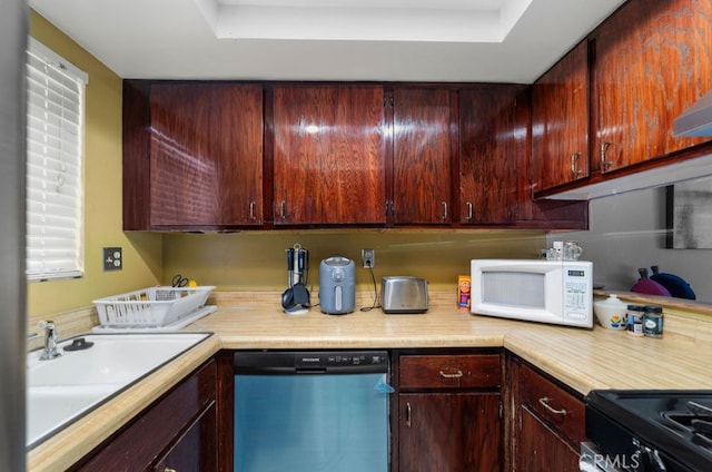 kitchen with dishwasher, a raised ceiling, black electric range oven, and sink