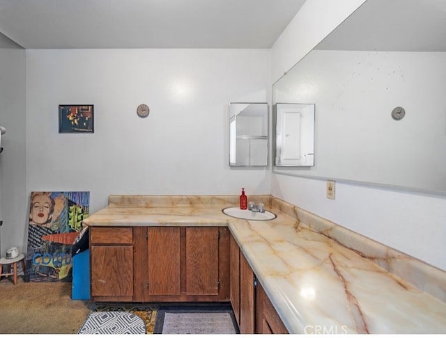 interior space featuring dark colored carpet and sink