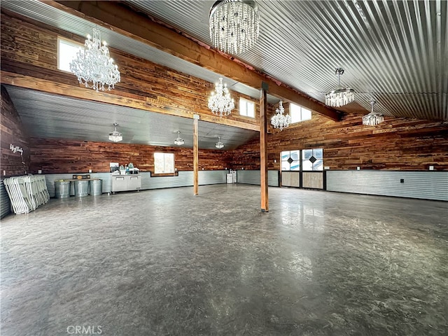 garage featuring wooden walls