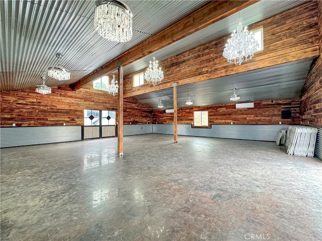 garage featuring wood walls