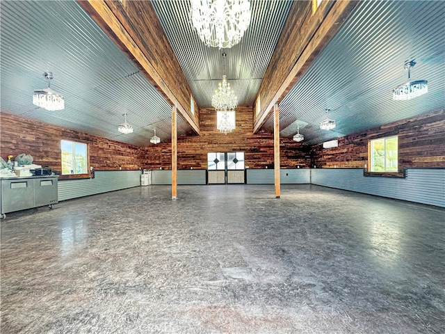 garage featuring wooden walls