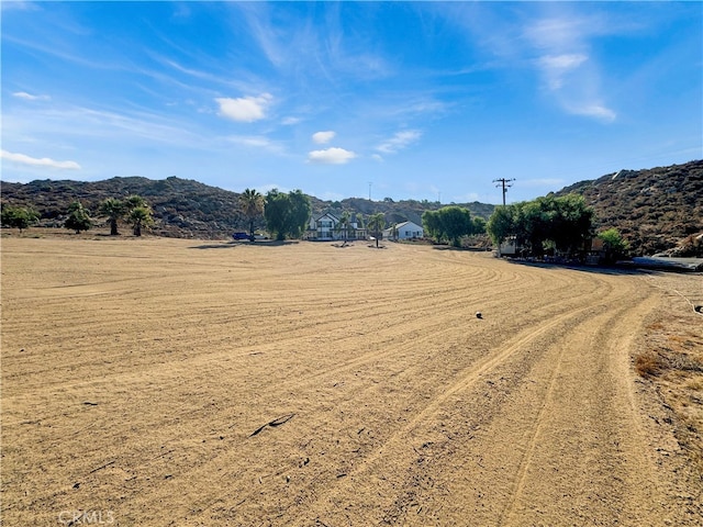 view of mountain feature with a rural view