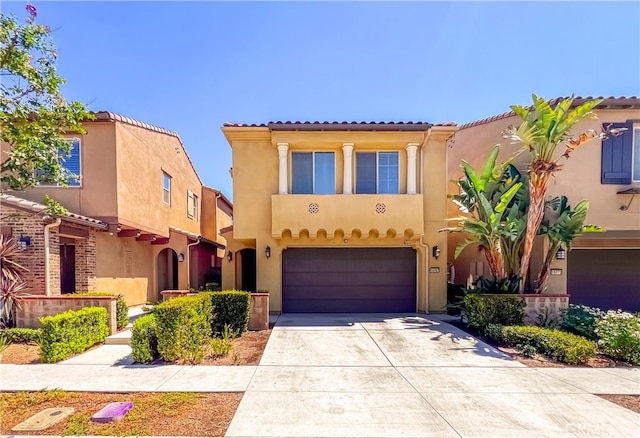 view of front of property with a garage